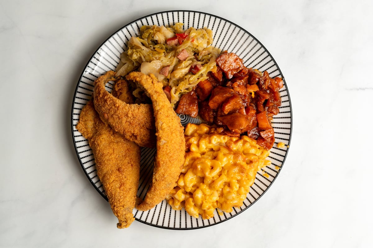 Fried fish platter with side dishes